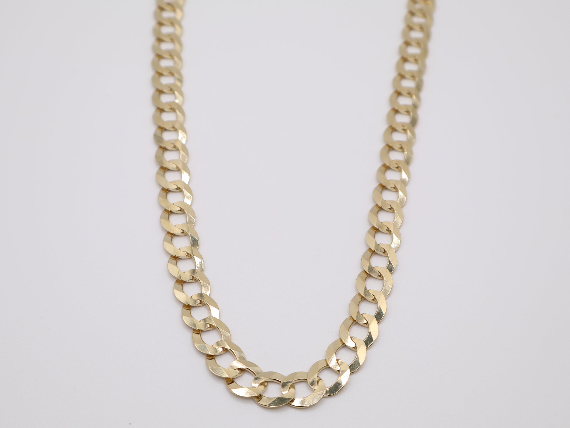 49.8g, 24in, 9.5mm Curb-Cuban Chain