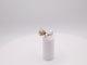 Gold earring with a pearl on a white background