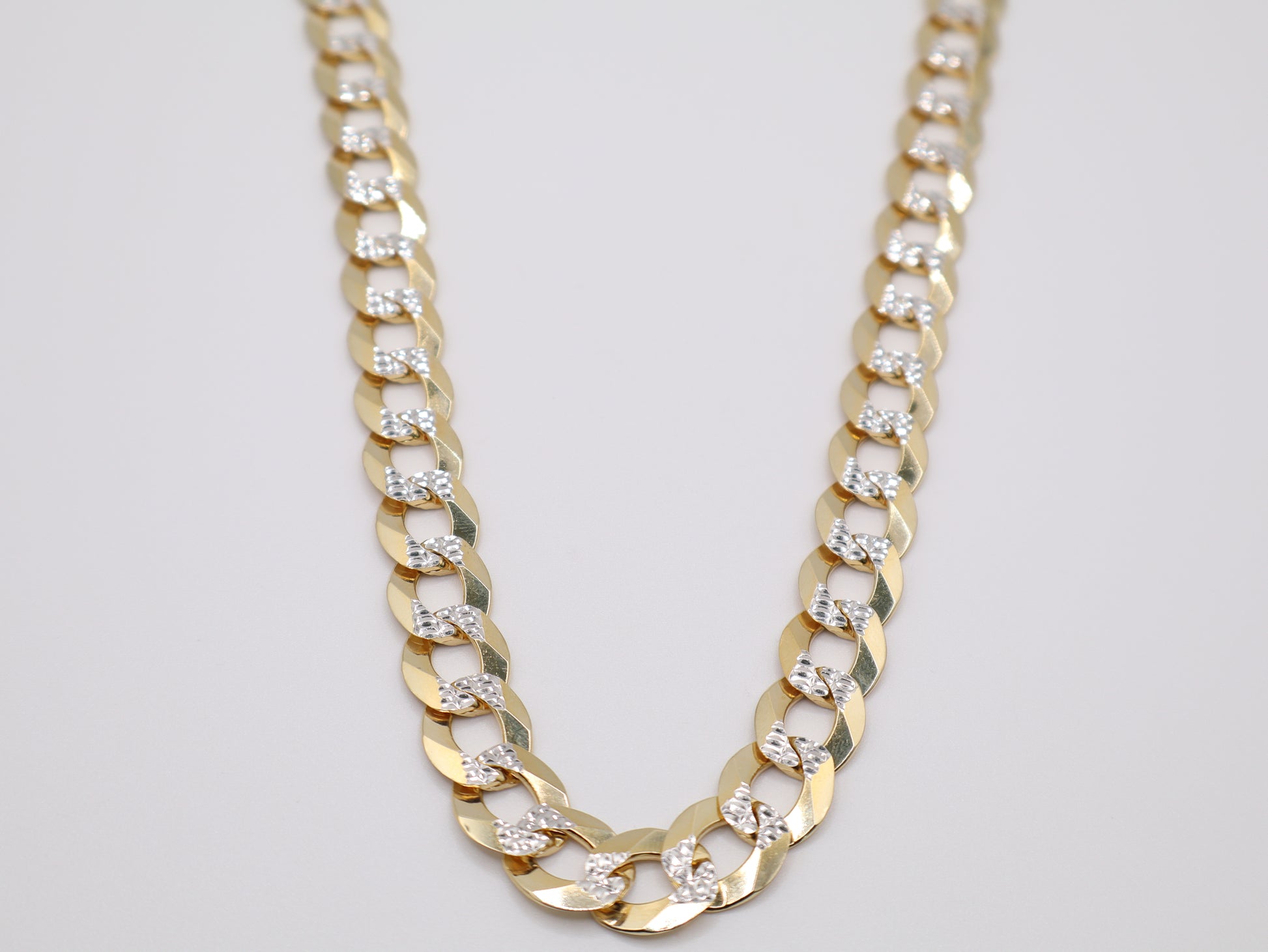 70.1g, 24in, 11mm Curb-Cuban Chain