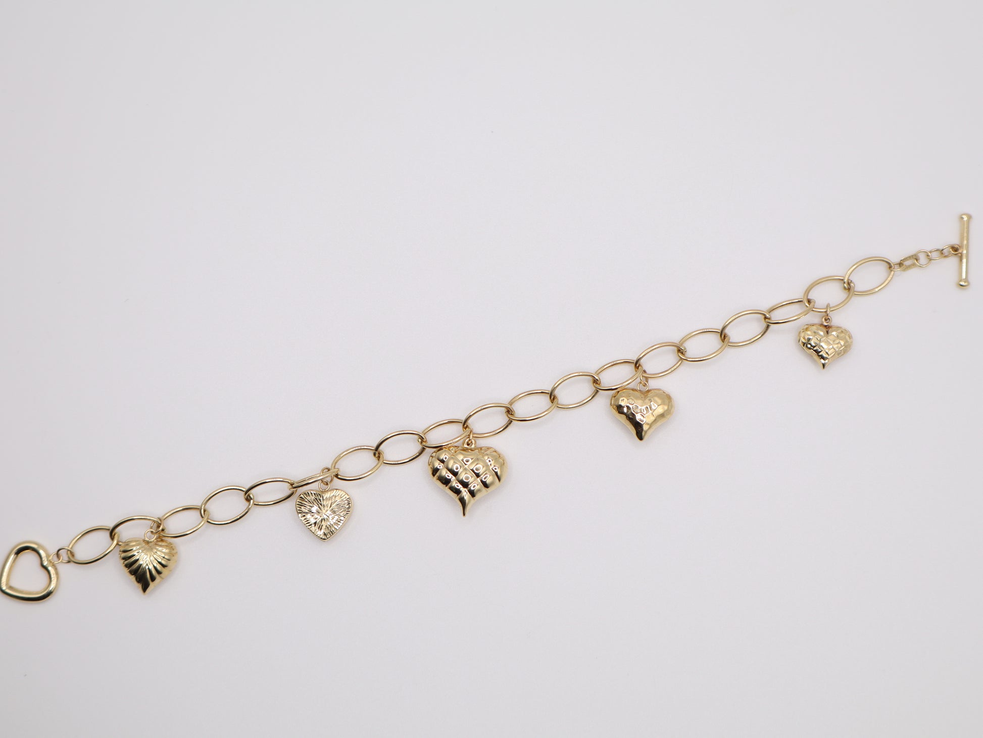 4.1g, 7.5in, 7mm Unique Heart Bracelet
