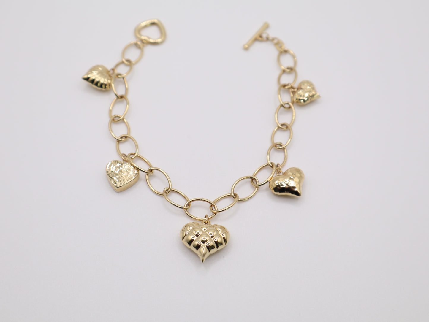 4.1g, 7.5in, 7mm Unique Heart Bracelet