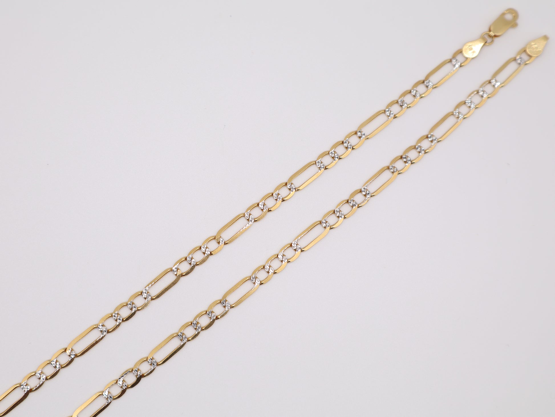 15.6g 22in, 4.77mm Figaro Chain