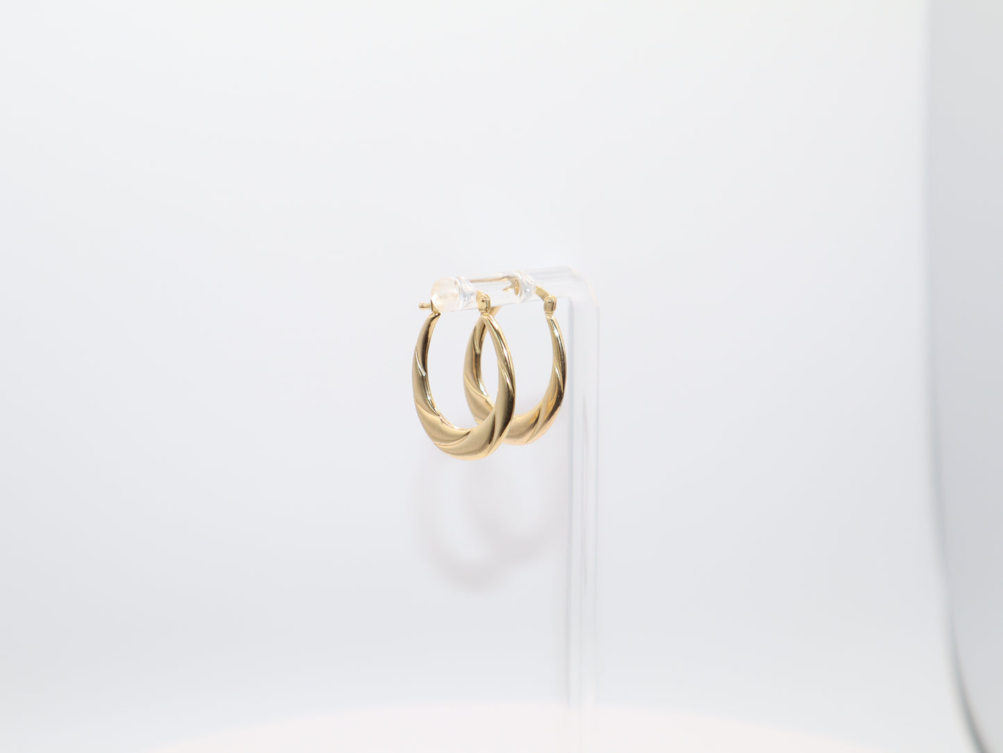 1.1g 1in,  Twisted Contemporary Earrings