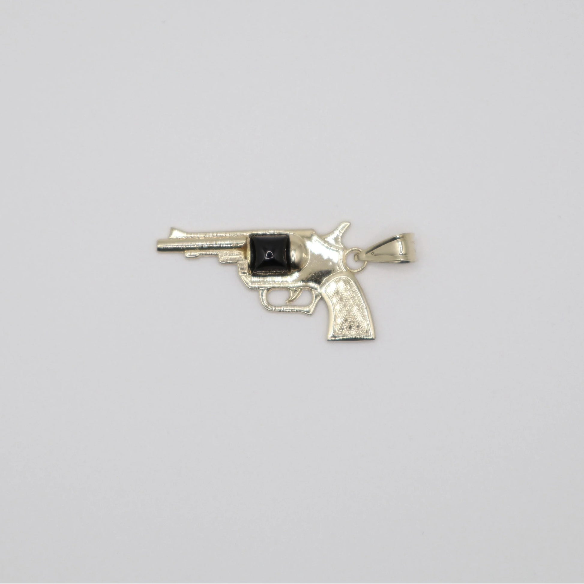 Revolver with Black Stone Charm