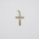 14K gold crucifix pendant with intricate openwork design on white background