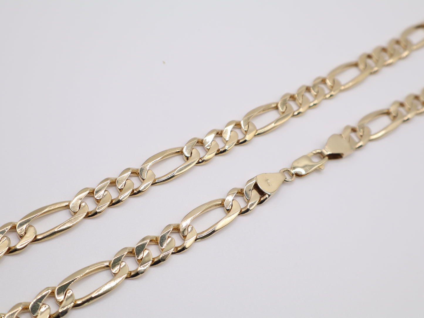85.3g, 23.75in, 10.11mm Figaro Chain