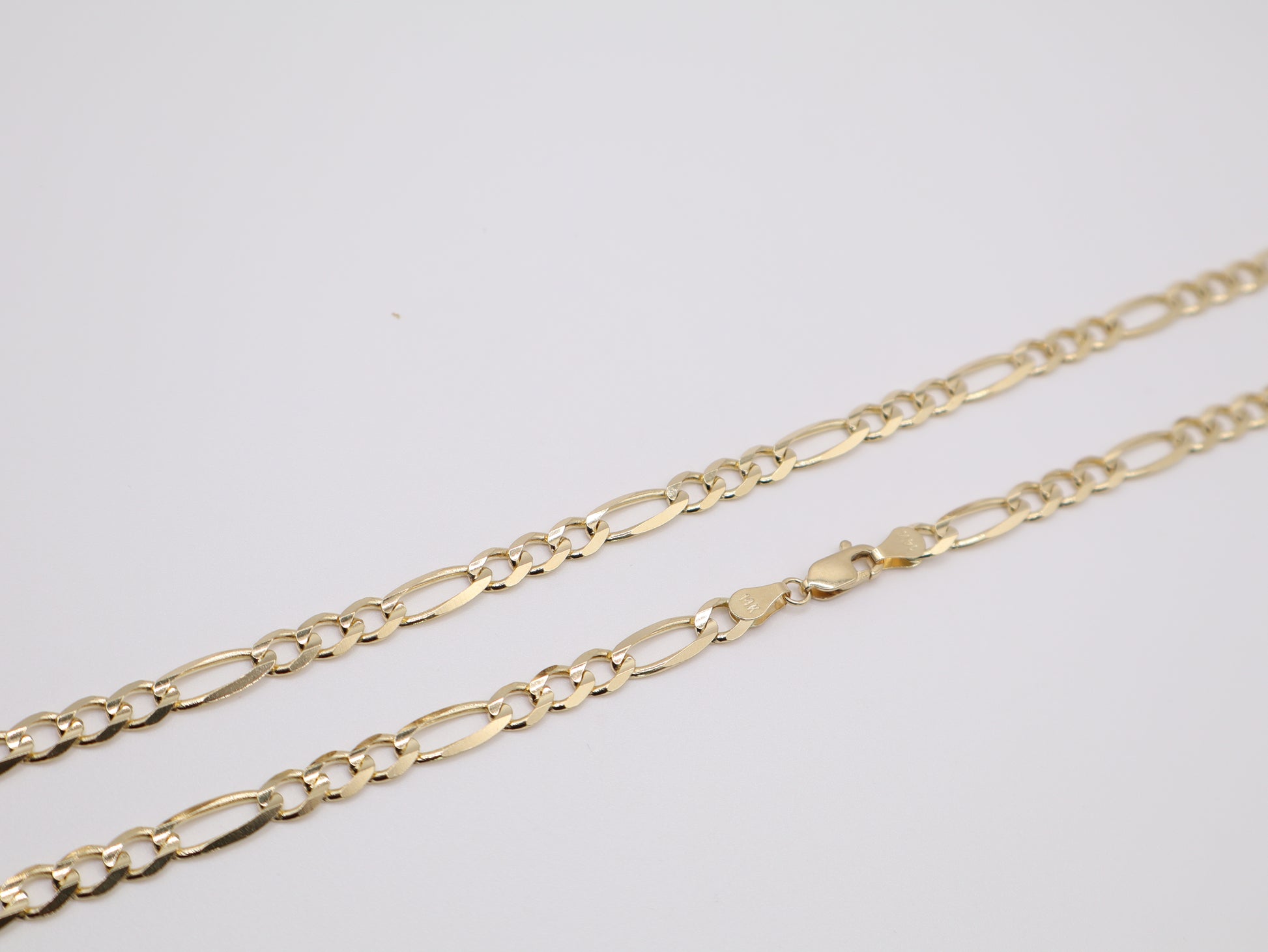 23g, 21.85in, 5.76mm Figaro Chain
