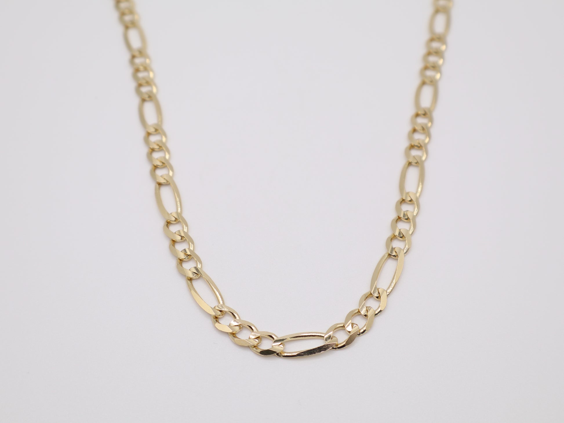 23g, 21.85in, 5.76mm Figaro Chain